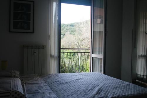 Ένα ή περισσότερα κρεβάτια σε δωμάτιο στο La Casa di Albi