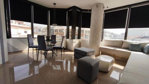 Posezení v ubytování Mitropoleos Luxury Suites