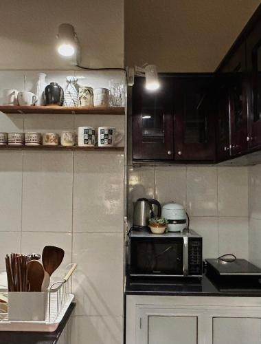 Η κουζίνα ή μικρή κουζίνα στο Thi Vị Homestay