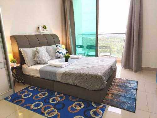 a bedroom with a bed and a large window at C-25-06 Lakeviewsouth Cybersquare WiFi Netflix FreeParking in Cyberjaya