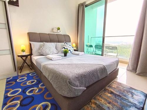 a bedroom with a large bed and a large window at C-25-06 Lakeviewsouth Cybersquare WiFi Netflix FreeParking in Cyberjaya