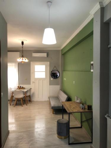 a living room with a couch and a table at Anatoli House Il in Gaios