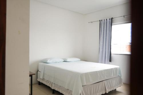 Postel nebo postele na pokoji v ubytování Hotel Galícia