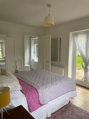 Postel nebo postele na pokoji v ubytování Kerry Country House
