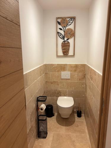 Ein Badezimmer in der Unterkunft Gîte les Huttières