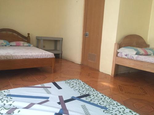 Postel nebo postele na pokoji v ubytování Jp baybay view beach resort