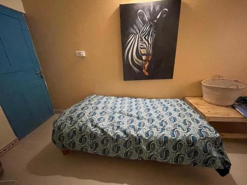 Postel nebo postele na pokoji v ubytování Bluu Bahari Villa in Uroa