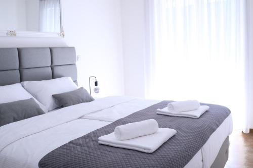 Postel nebo postele na pokoji v ubytování Artena Hotel