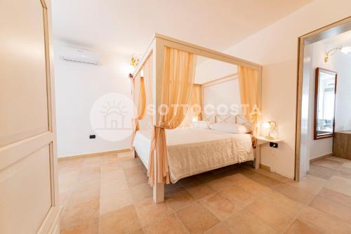 Ένα ή περισσότερα κρεβάτια σε δωμάτιο στο La Curte - B&B