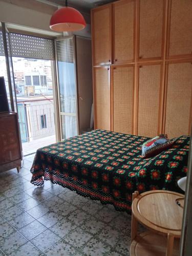 Postel nebo postele na pokoji v ubytování Casa Dei Greci