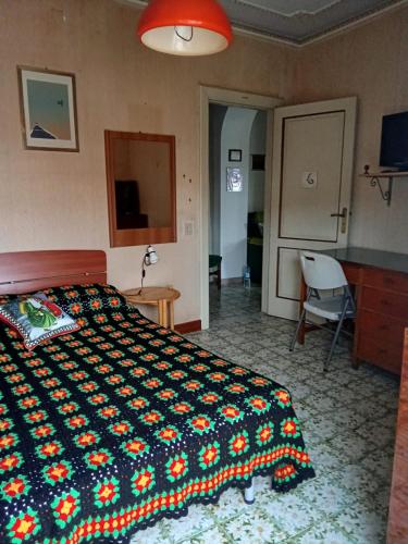 Postel nebo postele na pokoji v ubytování Casa Dei Greci