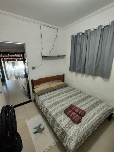Postel nebo postele na pokoji v ubytování Casa Praia Barequeçaba
