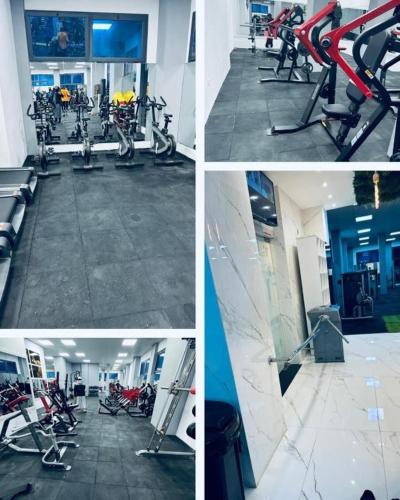 four pictures of a gym with bikes in a room at Villa haut standing avec piscine chauffée sans vis-à-vis et hammam in Ouled Moussa