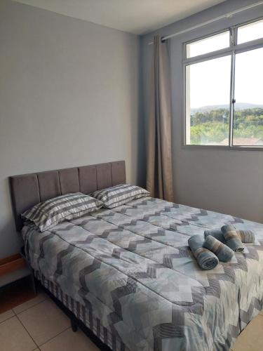 Katil atau katil-katil dalam bilik di Gracioso ap in Sete Lagoas