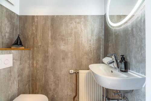 Koupelna v ubytování Inselliebe unter Reet