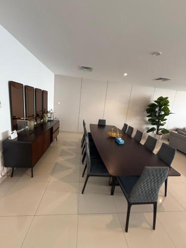 a dining room with a table and chairs at 4BR Luxury Retreat & Prvt Pool in Sharm