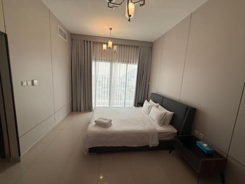 a bedroom with a bed and a large window at 4BR Luxury Retreat & Prvt Pool in Sharm