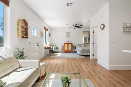 a living room with a couch and a table at The Little Oasis in Escondido