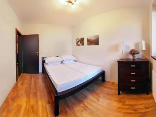 Ліжко або ліжка в номері Apartment Hviezdička