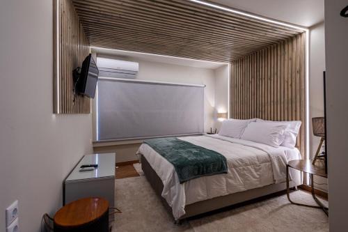 Ένα ή περισσότερα κρεβάτια σε δωμάτιο στο Cozy Home