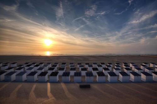 an empty amphitheater with the sunset in the background at penthouse studio residentie Mercator, in Ostend