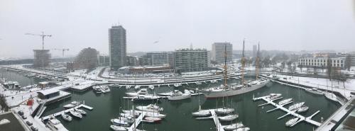 a harbor filled with lots of boats in the water at penthouse studio residentie Mercator, in Ostend