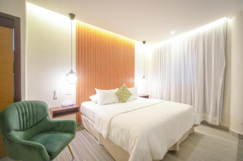 Postel nebo postele na pokoji v ubytování HOTEL ALKQUIMIA
