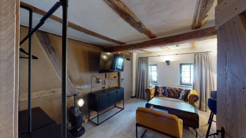 Μια τηλεόραση ή/και κέντρο ψυχαγωγίας στο Hotel Alte Schule