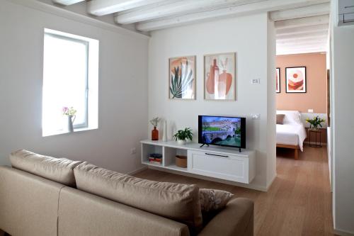 TV a/nebo společenská místnost v ubytování Al Ponticello