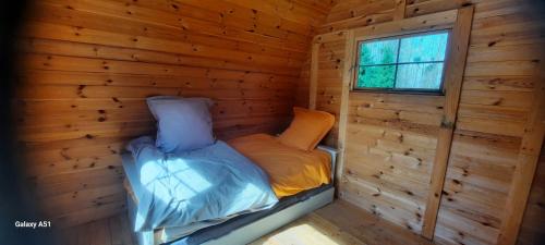 Postel nebo postele na pokoji v ubytování La cabane