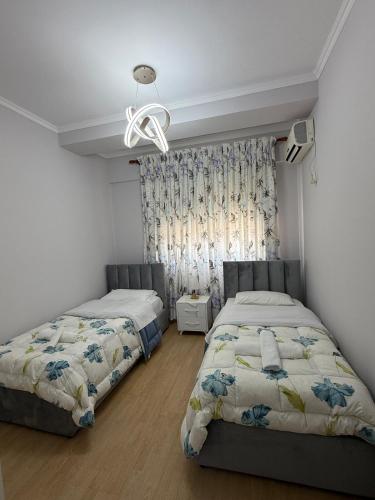 Sea view Apartment में एक कमरे में एक या कई बेड