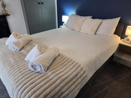 Ένα ή περισσότερα κρεβάτια σε δωμάτιο στο Comfort Cove