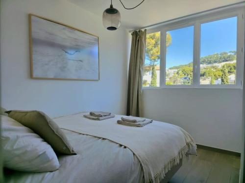 En eller flere senge i et værelse på Casa B- Splendid rooftop overlooking the sea