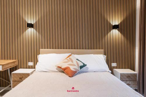 Postel nebo postele na pokoji v ubytování Suites 167