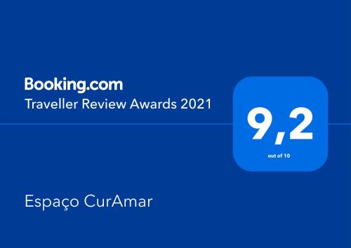 a screenshot of the travel review awards at Espaço CurAmar - Praia de Itamambuca in Ubatuba