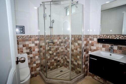Ванная комната в Apartamentos Roman