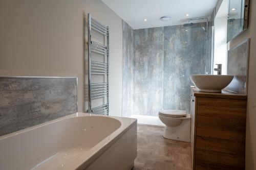 Koupelna v ubytování Church Road Retreats - The Reef