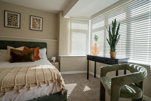 Postel nebo postele na pokoji v ubytování Church Road Retreats - The Reef