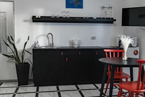 Kuchyň nebo kuchyňský kout v ubytování TREND HOUSE Apartments