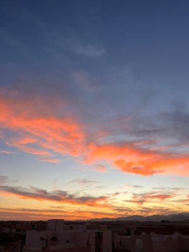 a view of a cloudy sky at sunset at اجمل تخيم في اجمل مناطق طبعيه in Sharm El Sheikh