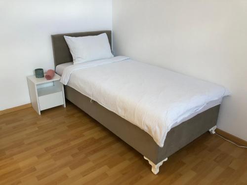 Postel nebo postele na pokoji v ubytování NK Apartment - Girls Only
