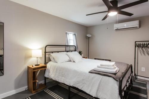a bedroom with a bed with a ceiling fan at 1Br 1bath - Greenway Garage w Firepit in Athens