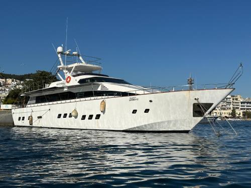 a large white yacht sitting in the water at Exclusive Yacht Stay - Best Sea & Old Town Views - Prime Location in Kavala