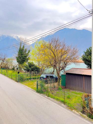 a car parked on the side of a road at Dascio Lake Garden Serenity in Dascio
