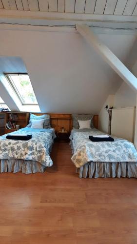 Katil atau katil-katil dalam bilik di Apartament nad Jeziorem