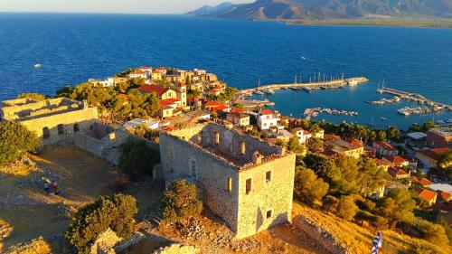an aerial view of a town on the water at Oneiro Paralio Astros Nisi in Paralion astros