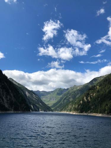 a view of a lake in the mountains at Bijou aus dem 18 Jahrhundert im Maggiatal in Fusio