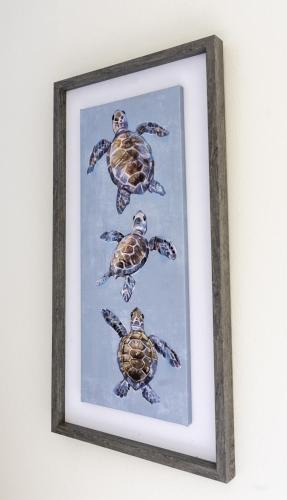 a framed picture of turtles on a wall at Riverview House in Glasgow