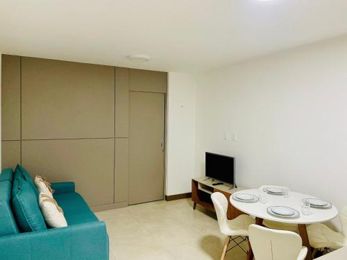 TV a/nebo společenská místnost v ubytování Apartamento de alto padrão com varanda