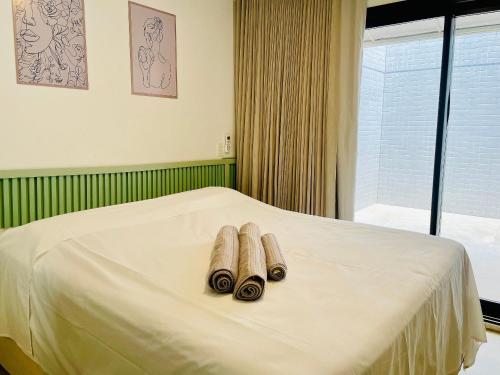Postel nebo postele na pokoji v ubytování Apartamento de alto padrão com varanda
